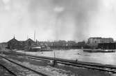 En serie bilder med anknytning till Karlstads Brandkår. Foto från 1920-talet med den numera igenfyllda delen av Inre hamn med Herrhagen i bakgrunden.