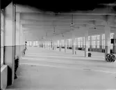 Gävle Ångväveri AB. Gefle Ångväfveri AB startades 1862 av Eric Sjöström. Företaget flyttade 1878 till Åkargatan med plats för 100 vävstolar och en ångkraftanläggning för driften. 1912 blev Hugo Müller disponent och lät uppföra en ny byggnad som stod klar 1918 och var mycket modern i utformning och konstruktion. Kvarteret byggdes ut 1927, med färgeri och 1934 med sidenväveri.

