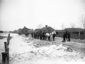 Snöröjning. Tidsomfånget är 1900 - 1940