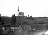Åmot kyrka. Tidsomfånget är 1900 - 1940