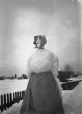 Snögubbe/gumma. Tidsomfånget är 1900 - 1940