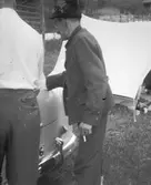 På campingen. Tidsomfånget är 1900 - 1940