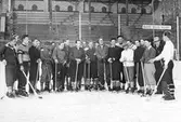 Bandy på Stockholm stadion. Femte man från höger Åke Nordin. Bilden ingår i ett fotoalbum
