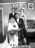 Dagny och Evald Svensson, tärna Astrid Svensson och bestman Bertil Johansson
