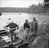 Fiskefänge. Mannen tar hand om nätet
