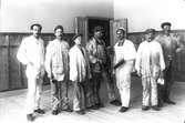 En grupp målare. Mannen längst till vänster är Målar-Erhard Nilsson. Bilden troligen tagen 1915.