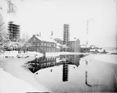 Hammarby Sulfitfabrik / Kopparfors. År 1886 kom en sulfitfabrik att ersätta järnbruket. Den var under en tid Skandinaviens största med över 400 personer anställda.
