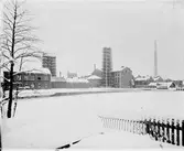 Hammarby Sulfitfabrik / Kopparfors. År 1886 kom en sulfitfabrik att ersätta järnbruket. Den var under en tid Skandinaviens största med över 400 personer anställda.
