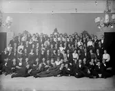 Okänd grupp män och kvinnor

