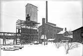 Gefle Stads gasverk, Brynäs. Anläggningen togs i bruk 1893, den större gasklockan uppfördes 1898. Ammoniakverk uppfördes 1903 och ett kokstorn 1926. Produktionen av gas pågick till 1966 då den siste abonnenten Skoglund & Olsson övergick till eldrift.
Den mindre gasklockan ritades av Ferdinand Boberg, den större av John Eklund