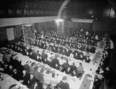 Konsum Alfas personal på konferens på Maxim. Maxim tidigare Södra Station. Gatuadressen har varit Stora Esplanadgatan. 8 januari 1938
