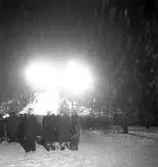 Måsbergsbacken, hopptävling i eljus. 7 mars 1951.
