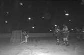Ishockeymatch GGIK - Canada, februari 1951. GGIK är förkortning för Gävle Godtemplares Idrottsklubb, kallades även för Godis eller Saftpiraterna.

