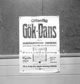 Reportage för Gefle Posten. Affisch om Offentlig Gök-Dans, onsdagen den 28 april kl. 8 em. Hamrångefjärdens Ordenshus. Hamrånge skidklubb. Vigzells orkester. År 1937

