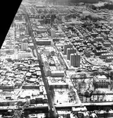 Flyg foto över Södra delen av Gävle. Med bl.a Slottet, Södertull och nybygget av Rådmansbron över Gavleån
