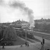 Järnvägsbommarna vid Nygatan, Centralstationen i bakgrunden


