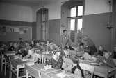 Praktiserande elev från Seminariet i Gävle. 1946. Reportage för Arbetarbladet.