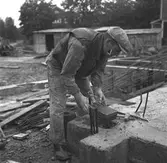 Inmurning av dokument i grunden på Nynässkolan.           26 september 1948.
