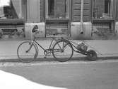 Elektriskt cykellyse. Vid Olssons Blomsterhandel, Nygatan 15. Den 26 Juni 1941.