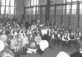År 1938. Avslutning vid Dövstumskolan. Reportage för Arbetarbladet
