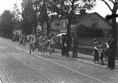 År 1938. Stafettväxling-löpning. Stadsloppet. Reportage för Gefle-Posten
