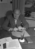 Landstingsdirektör Lundell. Reportage på landstinget. December 1949.