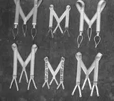 Bröderna Sandblom. Byxhängslen. 1930-års adresskalender Norra Centralgatan 17, 1945-års telefonkatalog Norra Skeppsbron 2

