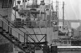 Fartyg på Ekensbergs varv 1970; i mitten sjömätningsfartyget JOHAN MÅNSSON, i bakgrunden skymtar det västtyska lastmotorfartyget ANNE LUND (urspr. CHARLOTTE BOHL).