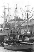 Fartyg på Ekensbergs varv 1970; på bilden ses bl. a. de finska lastfartygen SVANSJÖ (urspr. FINKENWARDER) och MARIESTRAND (urspr. BLÀFELL)); vidare i lilla dockan det danska lastmotorfartyget TONNA och i stora dockan det Panama-registrerade lastmotorfartyget BECKY.