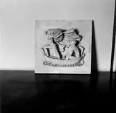 Förlaga till reliefen Snöfrid av konstnären Stig Blomberg. Denna finns på framsidan ovanför stora entrén vid museibyggnaden i Gävle på Strandgatan.