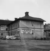 Kvarteret Nattväktaren, hörnet Kyrkogatan/ Norra Kansligatan.
Sistnämda gatudel är numera bebyggd: Tempo varuhus.