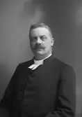 Nils Björkbäck. Levde mellan åren 1864-1931. Kyrkoherde i Järbo 1903 - 1922.