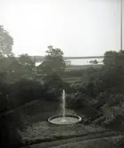 Utsikt över Tunasjön och Stallbacken med gamla inspektorsbostaden.