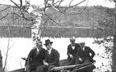 Fyra män i en båt