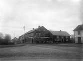 Lasarettsgatan mot bröderna Wigstrands hus. Bröderna Wigstrands affär. Wigstrand hade här verksamhet 1893-1920.