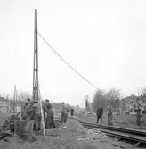 Reportage för Gefle Dagblad. Resning av stolpar. Centralen. År 1936


