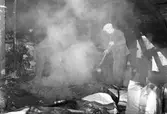 Brand i Koperativa förbundets lager på Stora Holmen. Den 31 mars 1943

