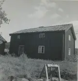 Bild på en enkelstuga.