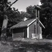 Liten bod med vällingklocka.