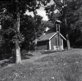 Liten bod med vällingklocka.