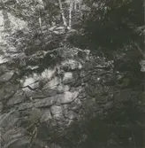 Pelle Stabys stenstuga i skogen.