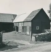 Motiv från en gård i Sjöstorp.