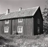 Sysvästra gaveln av en stuga på gården Arbelunda 3:3.