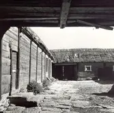 Ladugård och portskjul på Södra Norrby 1:2.