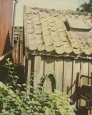 Liten byggnad i kv Björken.