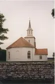 Sandby kyrka.

Kyrkan stod färdig 1863 och ersatte en medeltida klövsadelkyrka med två torn. Nuvarande kyrka består av rektangulärt långhus med kyrktorn i väster, tresidigt avslutat kor i öster samt sakristia i norr.