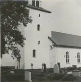 Löts kyrka. Västtornet från sydväst med ny puts.