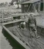 Friluftsmuseet på Långåsen, Mönsterås. T.h. skymtar Applerumsboden