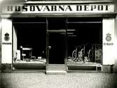Husqvarna Depot. Symaskiner och en cykelaffär.