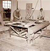 I samband med att byggandet av hyreslägenheter tog fart under 1950-talet började byggmästare Ivar Tegnander tillverka egna köksutrustningar. Verksamheten expanderade och under 1960-talet bildades AB Standardsnickerier, senare Kalmarkök, som tillverkade köksinredningar för såväl flerbostadshus som villor. Verksamheten bedrevs i kvarteret Giraffen. När den upphört övertogs lokalerna av Kooperativa Förbundet som öppnade Obs! stormarknad.